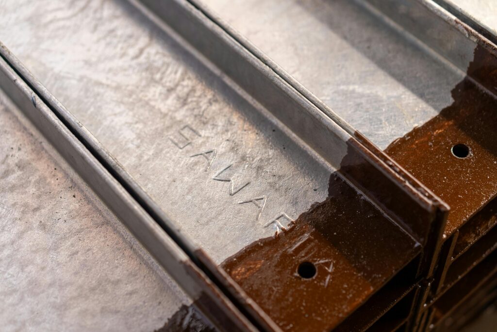 Detailed view of rusty metal rails showcasing texture and industrial style.